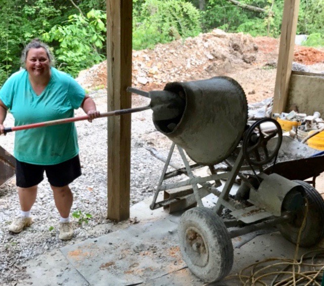 Sara mixing concrete